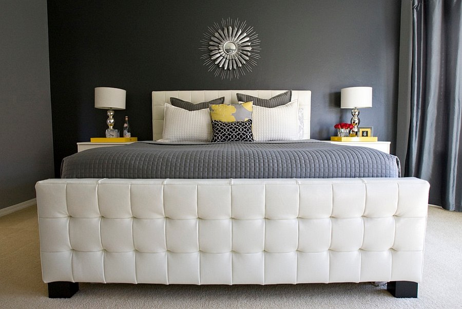 Luxurious master bedroom in gray with yellow accents