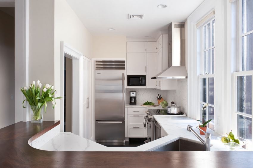 Marble countertops in a clean-lined kitchen