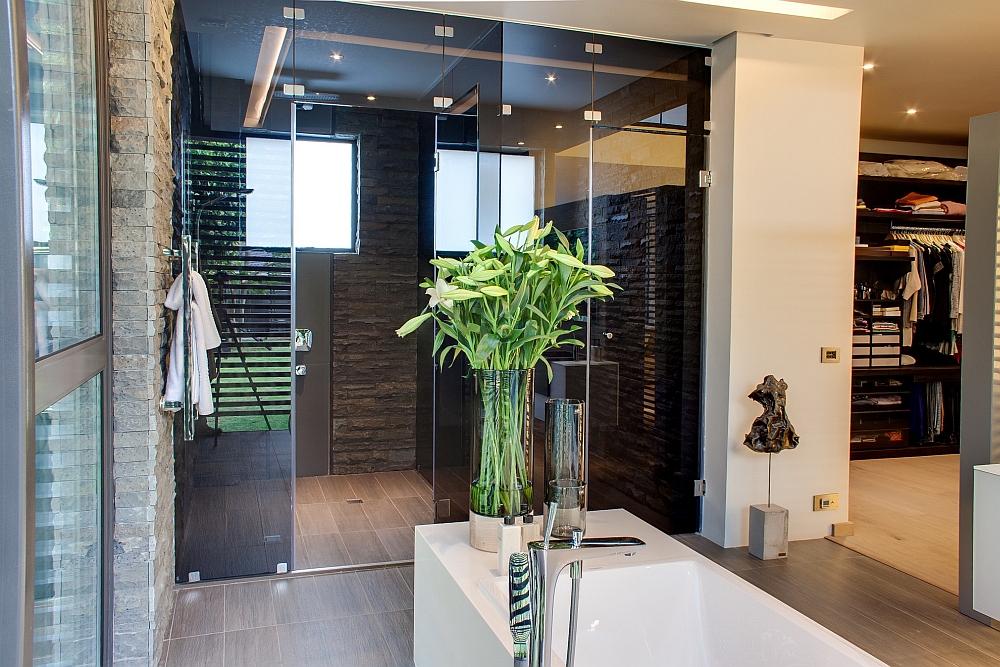 Master bathroom that is connected with the walk-in closet