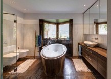 Modern-bathroom-with-standalone-bathtub-and-wooden-vanity-217x155