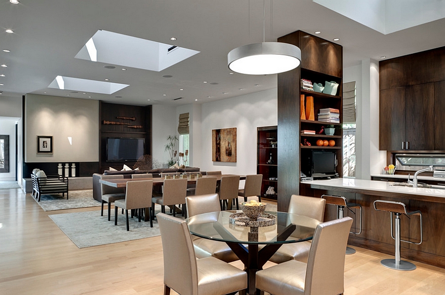 Open dining and living room with loads of natural light [Design: Domiteaux + Baggett Architects]