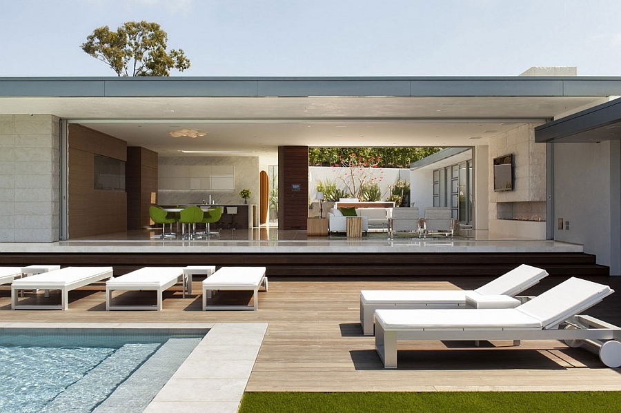 Open plan living area connected with the pool deck