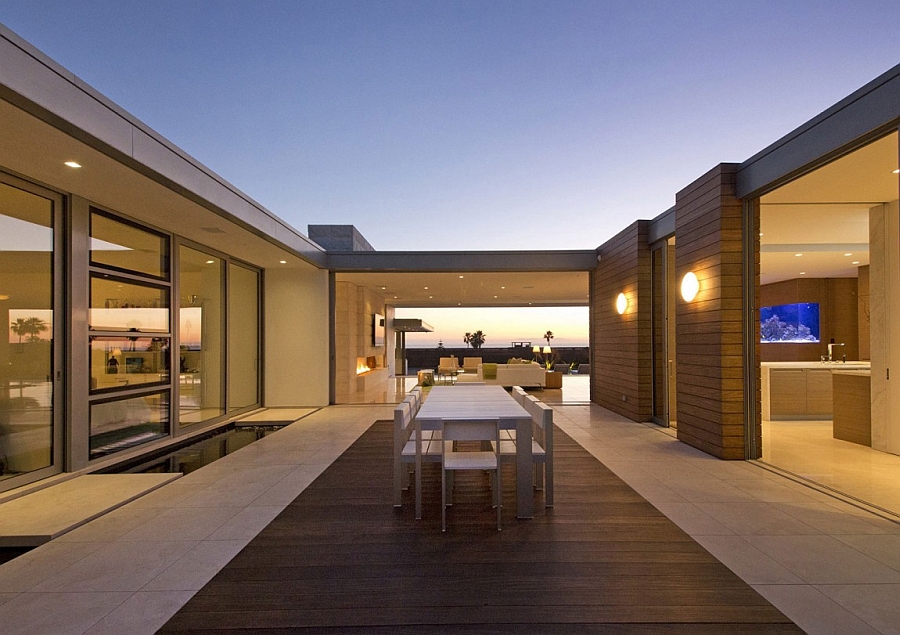 Outdoor dining space in the central courtyard of the luxurious residence