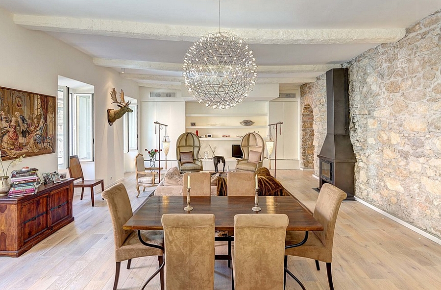 Pendant light becomes the focal point in the eclectic space [Design: Callender Howorth]