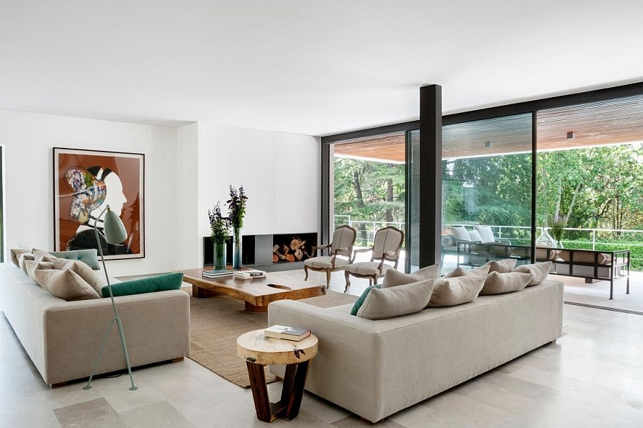 Sliding glass doors connect the living area with the balcony