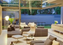 Sliding-glass-doors-connect-the-living-space-with-the-garden-outside-217x155
