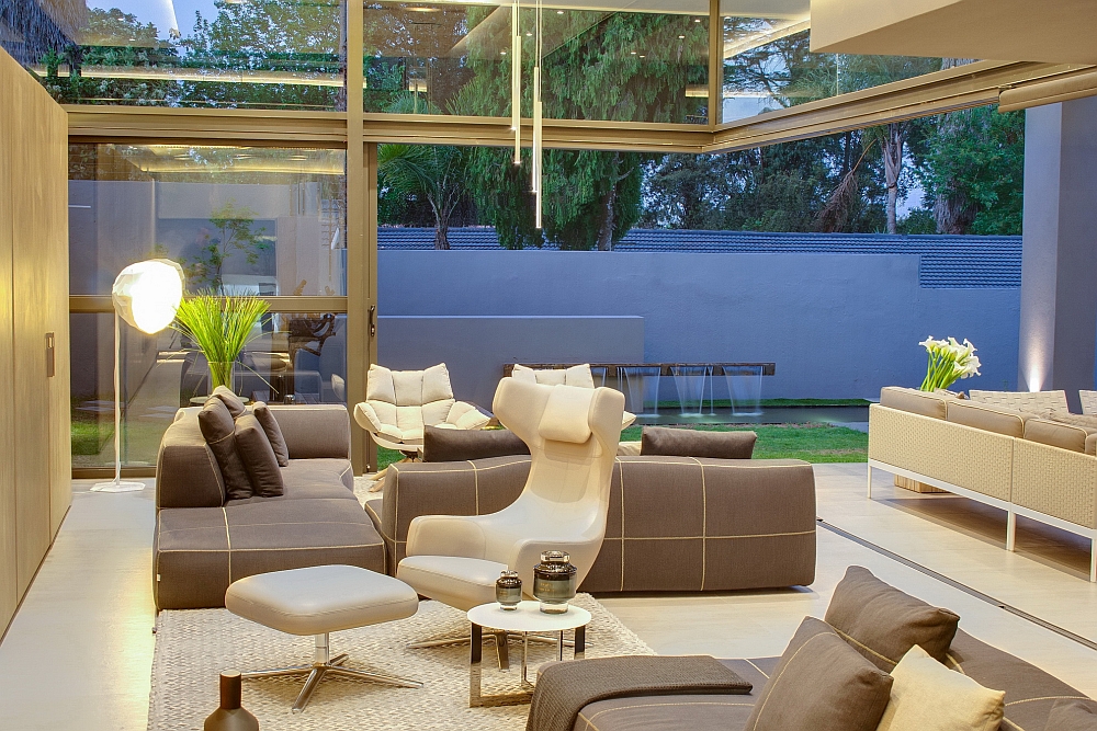 Sliding glass doors connect the living space with the garden outside