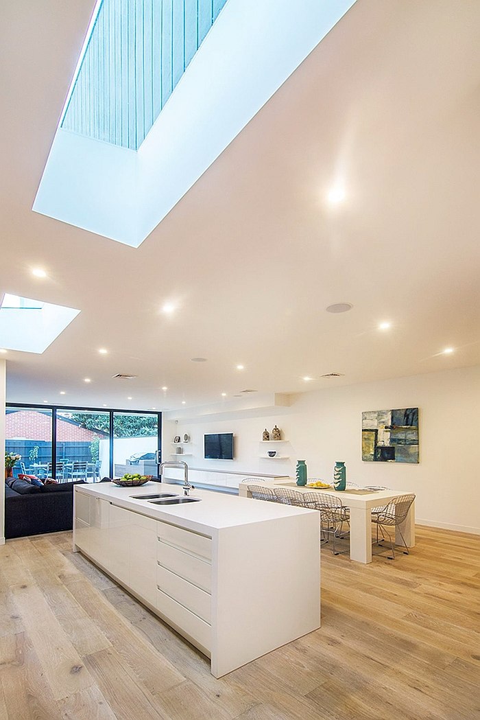 Smart ceiling design brings natural light to the lower level of the home