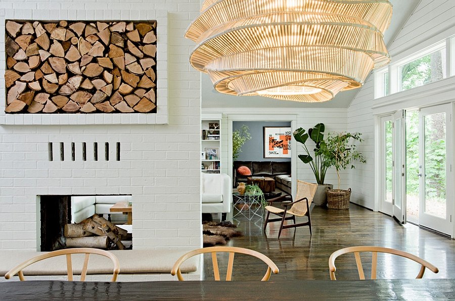 Smart firewood storage space becomes an artistic addition in this dining room