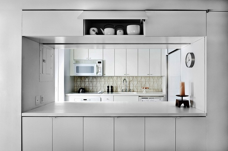 Smart kitchen shelves give the space a sleek, organized appeal