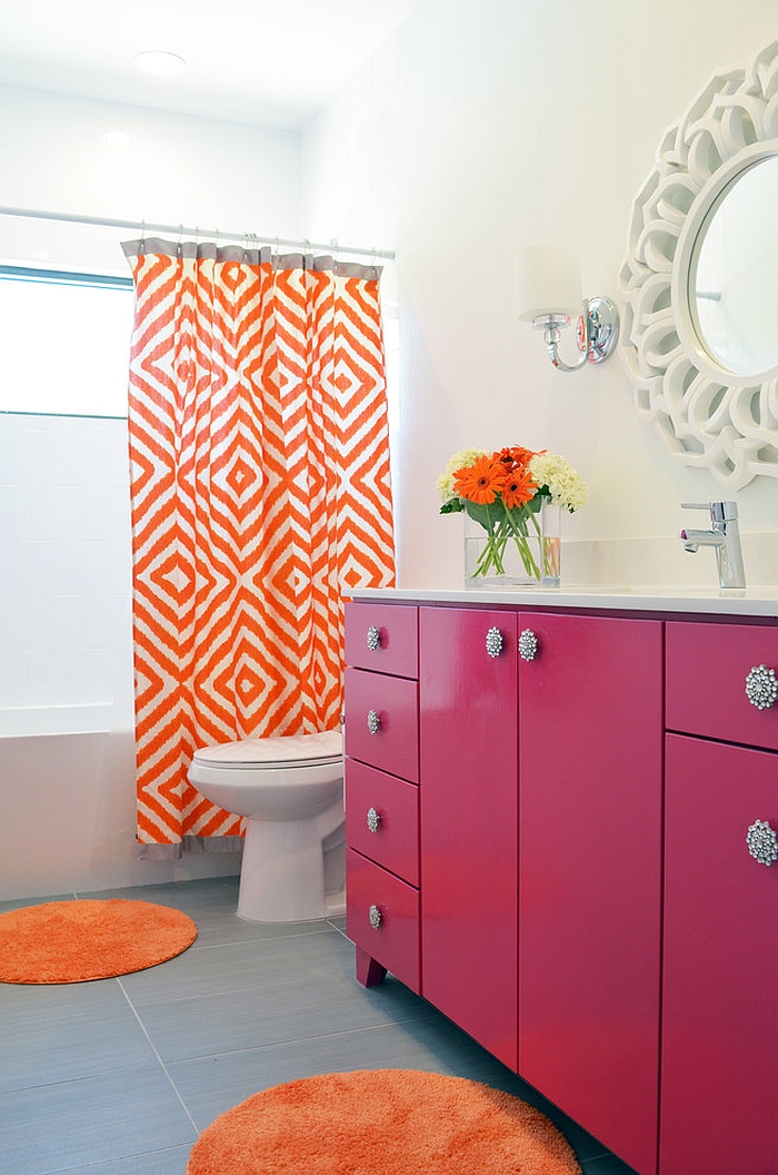Snazzy modern bathroom with a pink and orange color scheme [Design: New Leaf Construction]