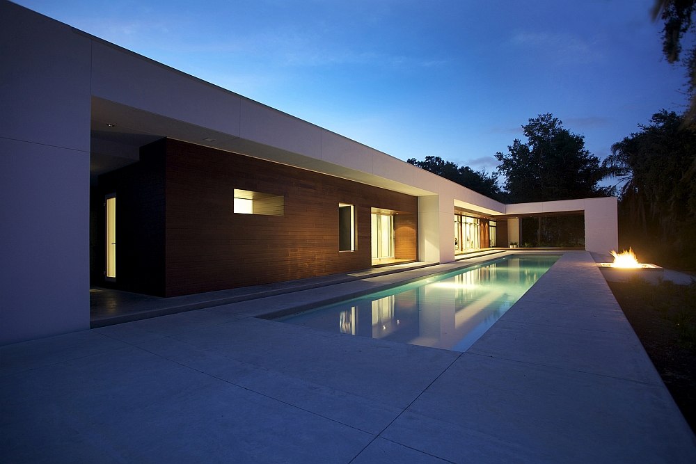 Spacious outdoor courtyard with pool and firepace