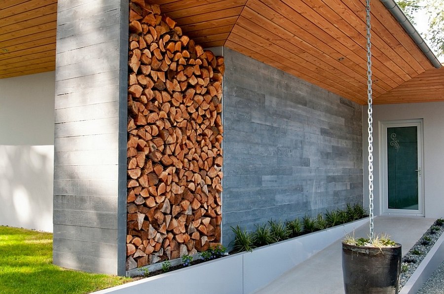 Stacked firewood gives this entry a dramatic makeover [Design: NZ Builders]