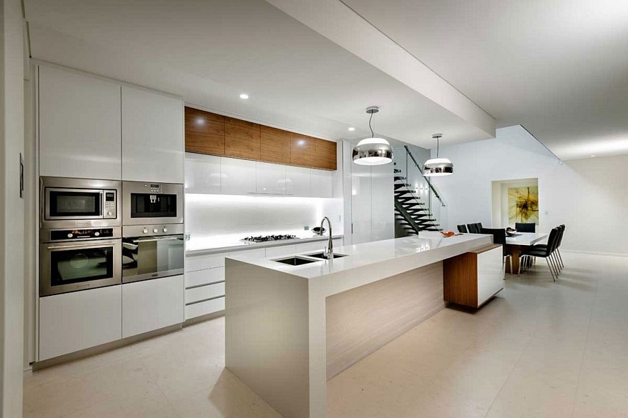 State-of-the-art kitchen in white with beautiful lighting