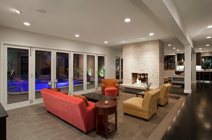 Sunken living room connected with the pool outside