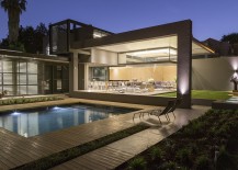 Swimming-pool-and-the-outdoor-garden-of-House-Sar-217x155
