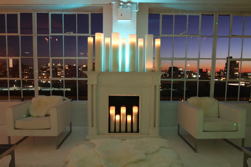 Tall candles in a winter loft venue