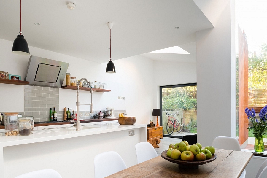 Tiles in gray give the kitchen a simple, unique backdrop