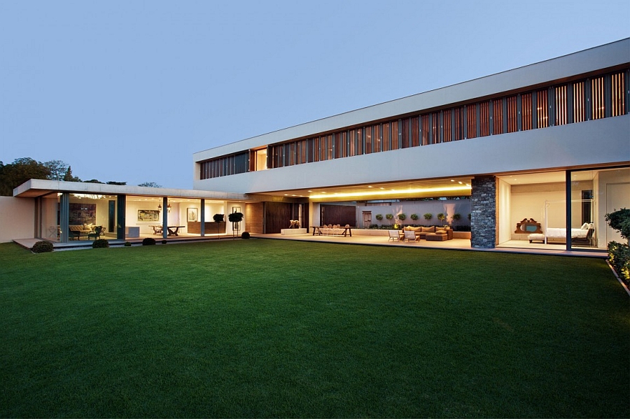 Timber shutters and windows give the home a unique look