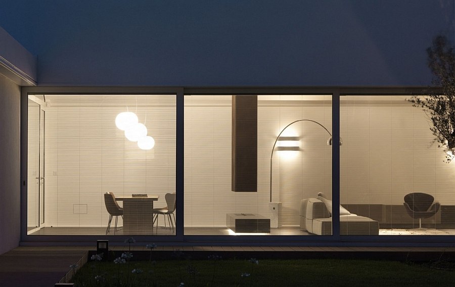 View of the dining and living areas from the courtyard outside