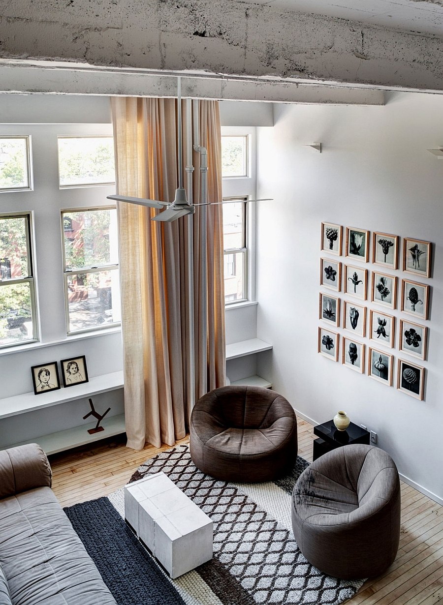 View of the living room with a gallery wall from the mezzanine level