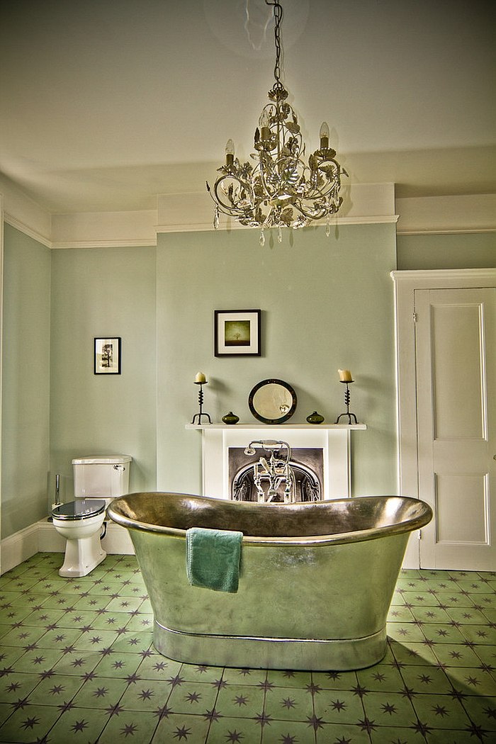 Vintage bathroom in green with a standalone bathtub