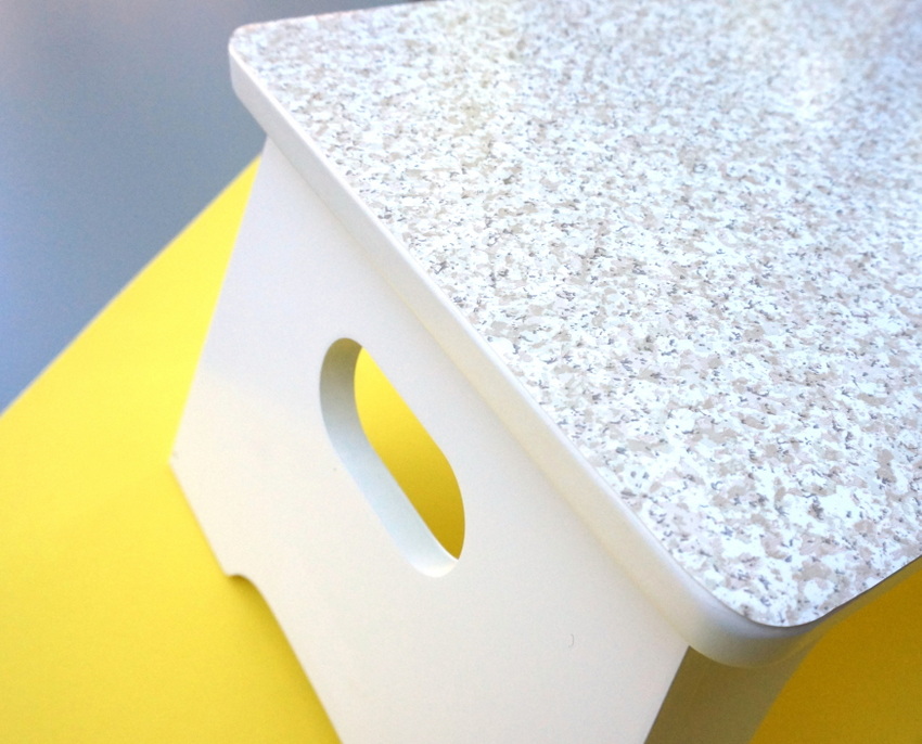 White step stool with a patterned top-001