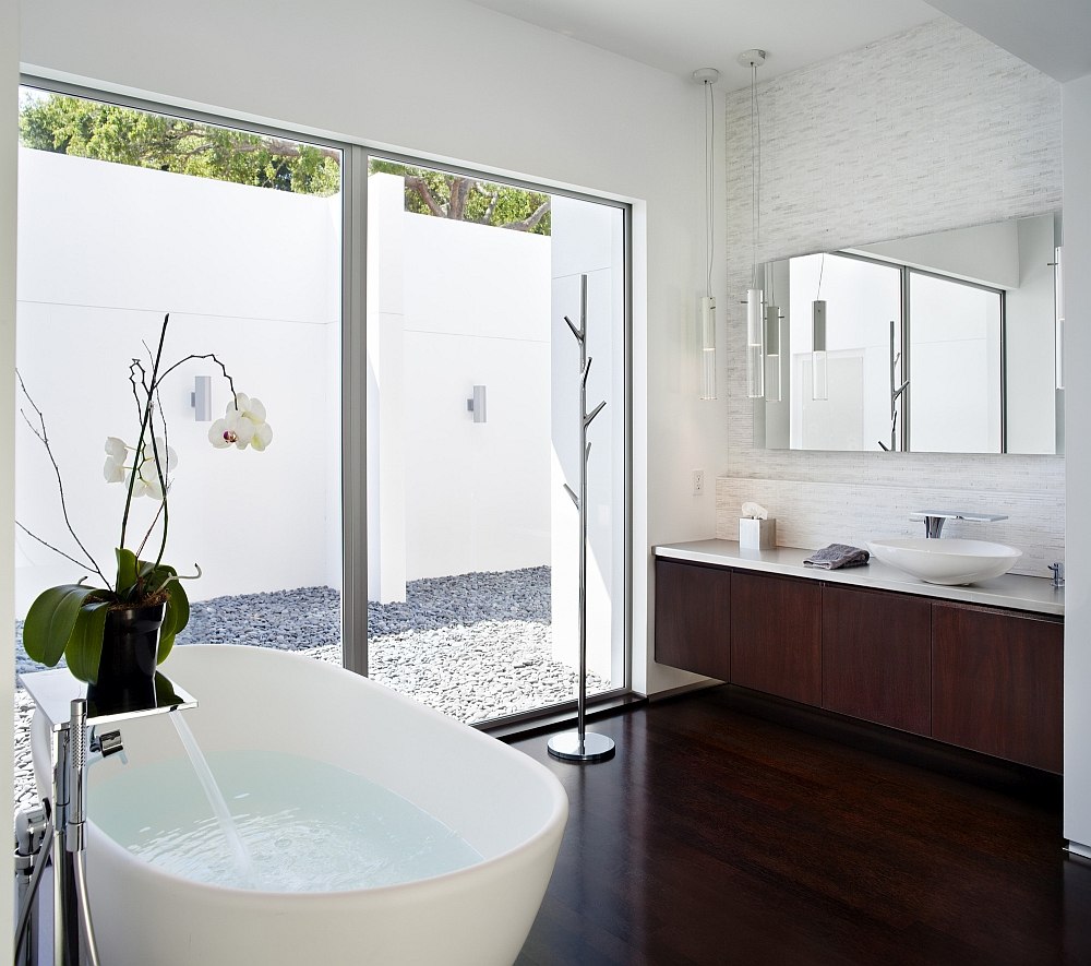 Wonderful use of texture to enliven the contemporary bath in white