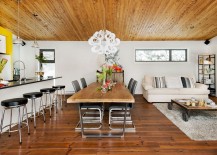 Wooden-ceiling-and-faulous-chandelier-set-the-tone-for-the-living-area-217x155