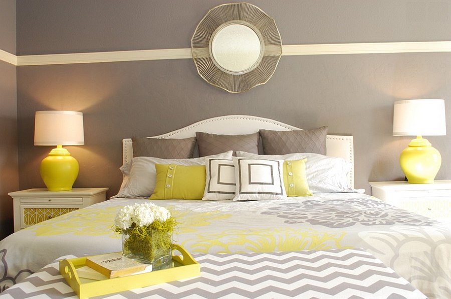 Yellow bedside lamps bring symmetry to the room