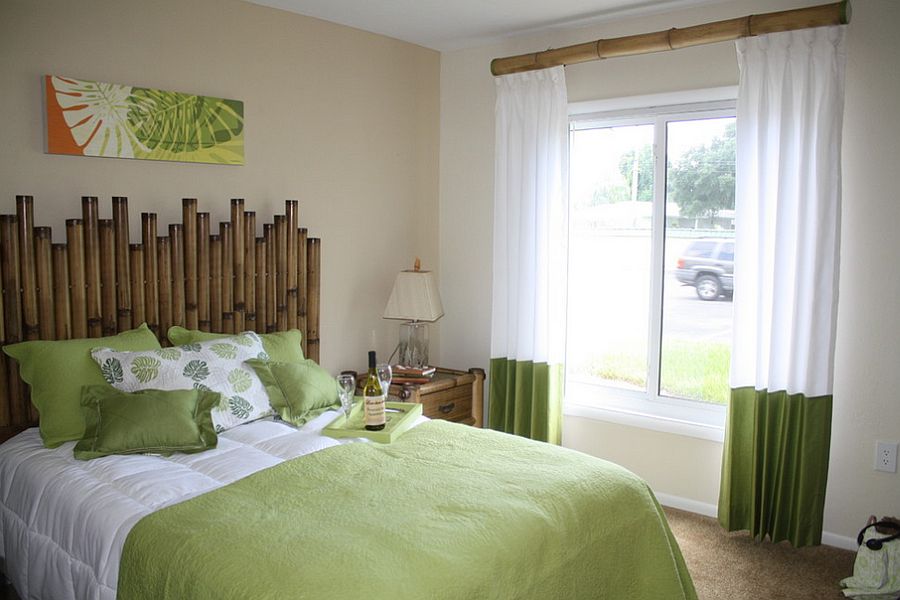 Bamboo headboard with a matching curtain rod and beside table for the tropical bedroom