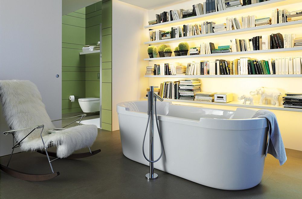 Bathroom with standalone tub and a sleek bookshelf