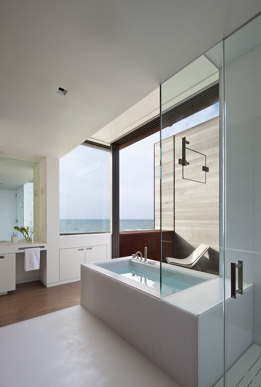 Beautiful contemporary bathroom in white with ocean views