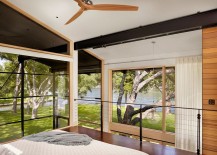 Bedroom-with-lovely-lake-views-has-an-open-airy-vibe-217x155