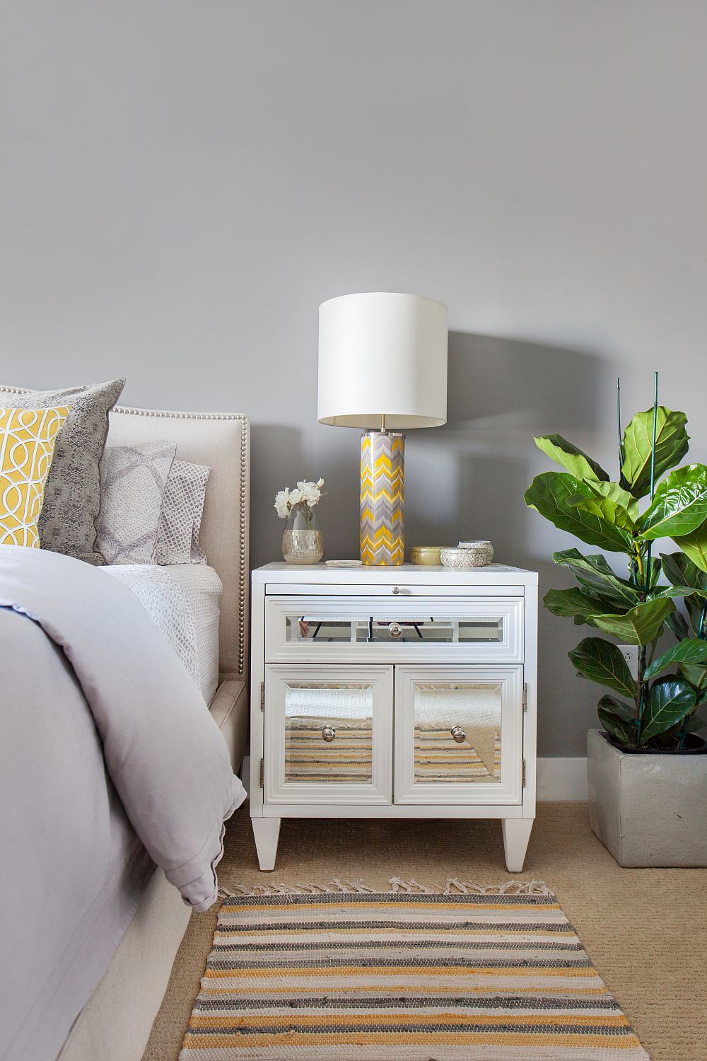 Bedside table lamp with yellow and gray chevron pattern