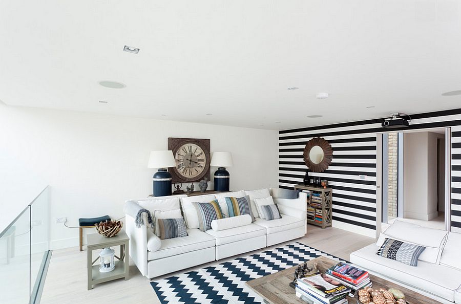 Black and white striped accent wall works with a wide range of styles