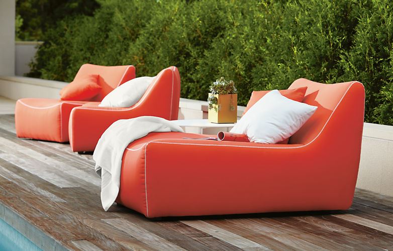 Bright orange chaise lounge from Room & Board