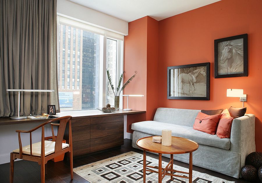 Contemporary home office in New york with orange and subtle hints of black and gray