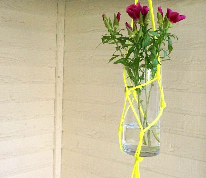 DIY hanging vase with purple flowers