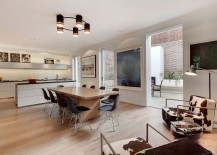 Dining-area-and-kitchen-that-is-connected-visually-with-the-spaces-outside-217x155