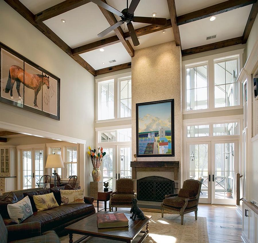 Fireplace, ceiling beams and wall art combine to give the living room a stunning ambiance