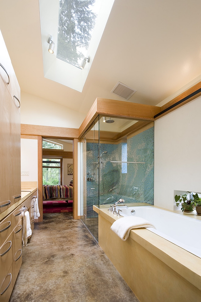 Give the narrow, modern bathroom an airy appeal with the skylight [Design: Balance Associates Architects]