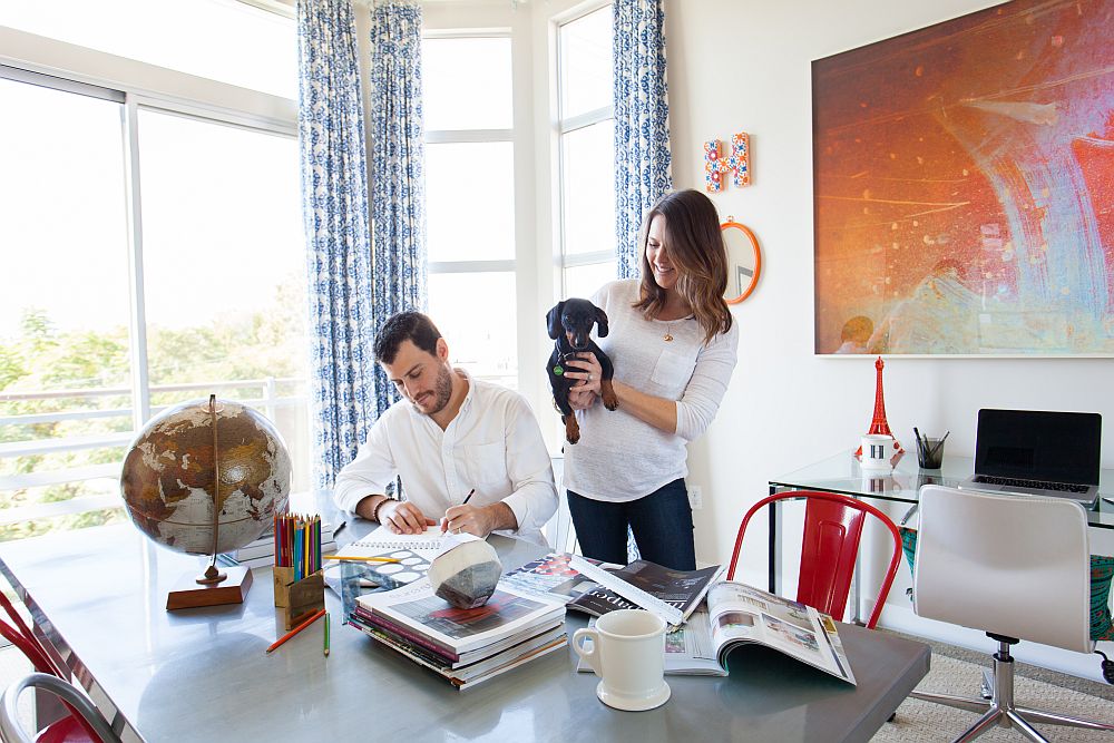 Large windows bring ample natural light into the home office