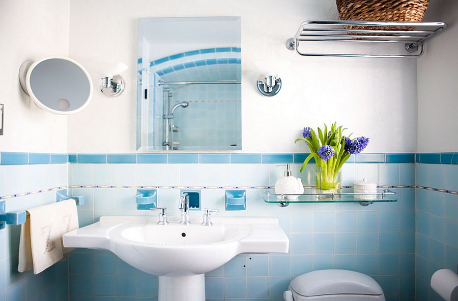 Lighting and wall tiles create a subtle ombre effect in the bathroom