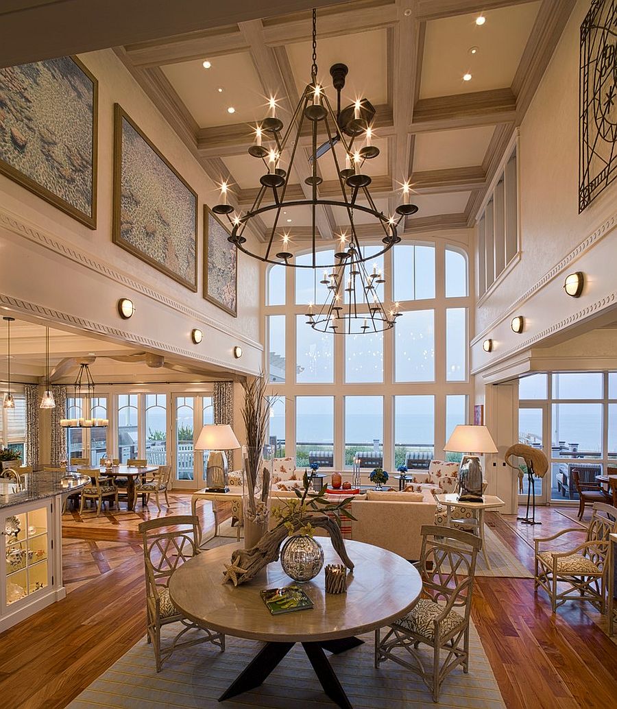 Lighting fixtures bring grandeur to the space [Design: Bruce Palmer Interior Design]