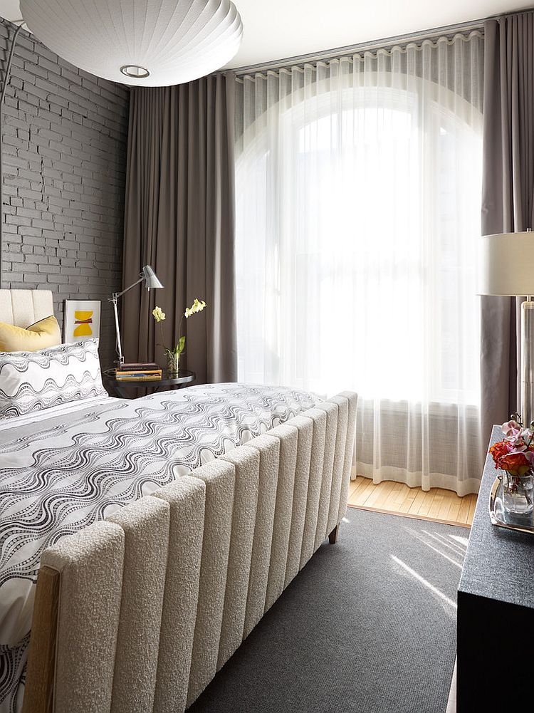 Lovely contemporary bedroom in gray with a variety of textures [Design: Tom Stringer Design Partners]