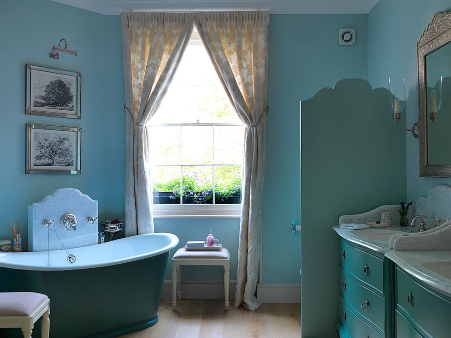 Lovely use of blue in the eclectic bathroom