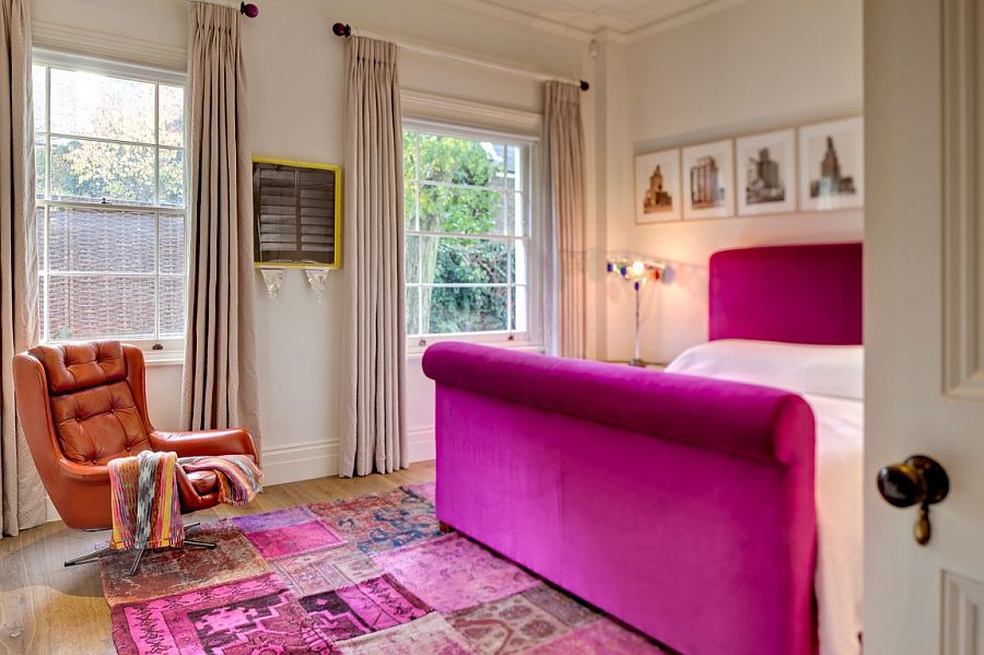 Plush decor and a splash of fuchsia in the master bedroom