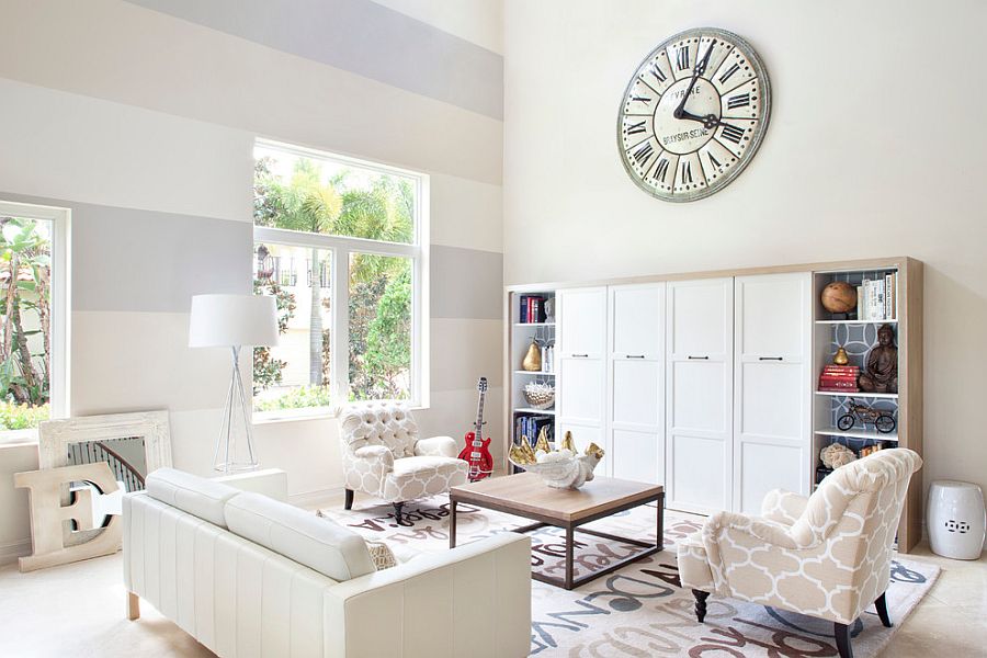 Serene living room with a cool accent wall [Design: Krista Watterworth Design Studio]