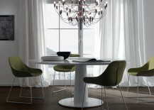Slender-base-of-the-dining-table-also-helps-in-saving-up-space-217x155